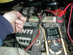 Start engine, charging voltage should read 14 - 15 volts.